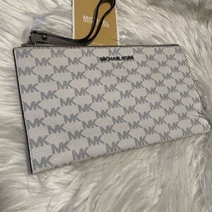 Authentic Michael Kors Silver Logo Wristlet